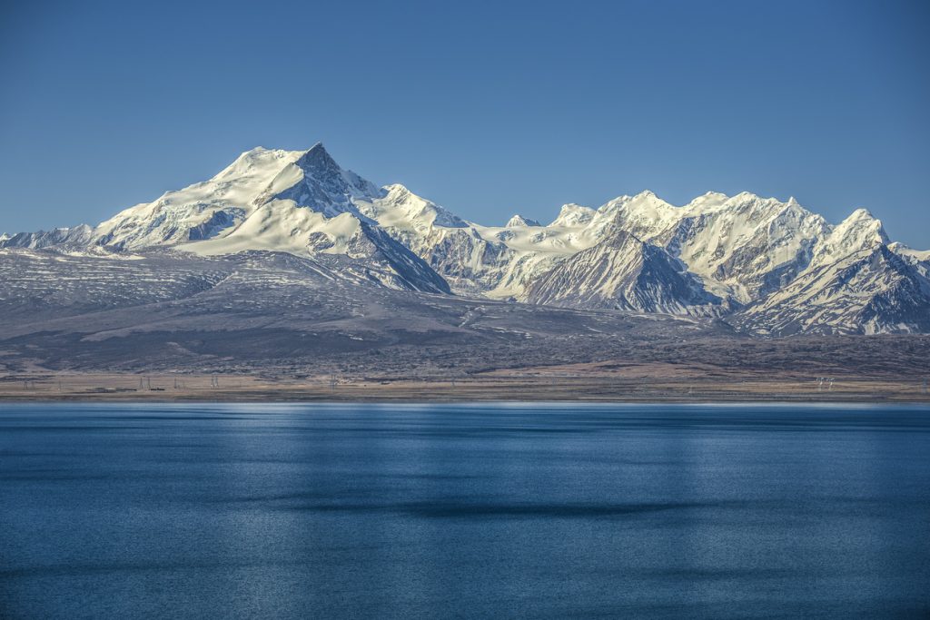 Pekhu Tso Lake with distant Shishapangma Mountain in Tibet